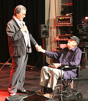 Actor Jim Nabors, 85, has a moment with Jimmy during a pre-concert audio check.